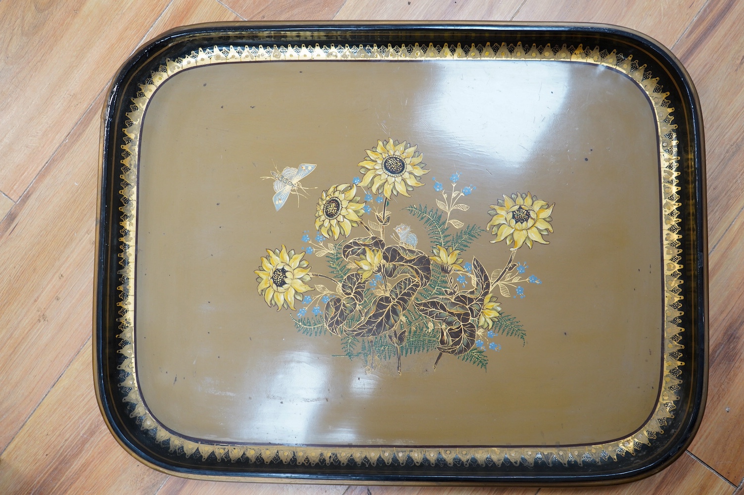 Three large Victorian papier mâché trays, largest 71cm wide. Condition - all have faults